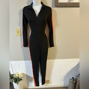 Fashion Nova Black Jumpsuit with Orange Side Stripes
